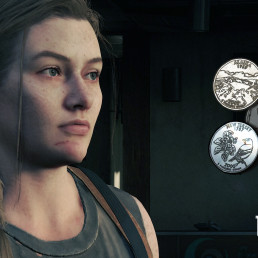 Image d'Abby de The Last of Us Part II regardant l'horizon. Ajout de 5 pièces à collectionner dans le jeu à sa droite en guise d'illustration.
